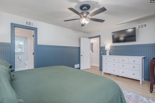 315 Bent Pine Dr, Columbia, SC 29212 - bedroom with a wainscoted wall, light wood-style floors, a ceiling fan, and ensuite bathroom