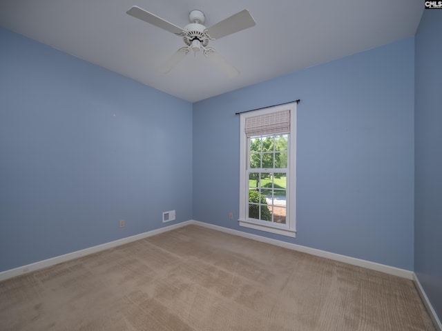 117 Falmouth Rise Rd, Columbia, SC 29229 - spare room with baseboards, a ceiling fan, and carpet