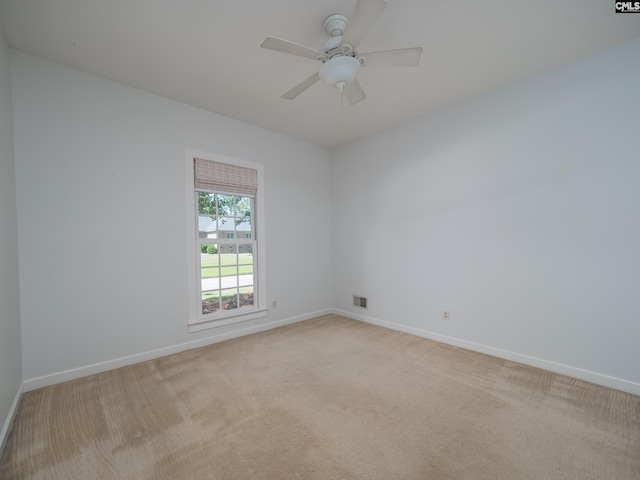 117 Falmouth Rise Rd, Columbia, SC 29229 - unfurnished room with baseboards, light carpet, and a ceiling fan