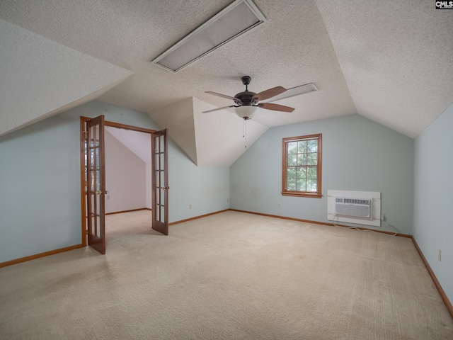 117 Falmouth Rise Rd, Columbia, SC 29229 - additional living space with an AC wall unit, carpet floors, ceiling fan, vaulted ceiling, and a textured ceiling
