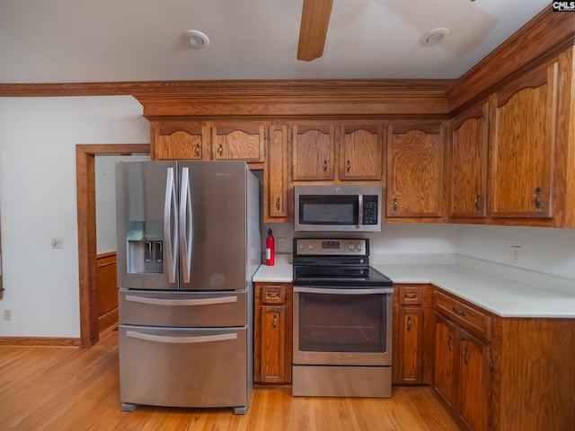 117 Falmouth Rise Rd, Columbia, SC 29229 - kitchen with appliances with stainless steel finishes, brown cabinets, light countertops, and light wood-style floors