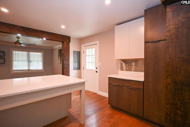 2110 Bouknight St, Newberry, SC 29108 - kitchen with electric panel, light countertops, baseboards, healthy amount of natural light, and recessed lighting