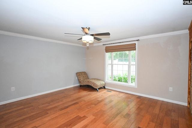 2110 Bouknight St, Newberry, SC 29108 - unfurnished room with baseboards, light wood-style floors, a ceiling fan, and ornamental molding