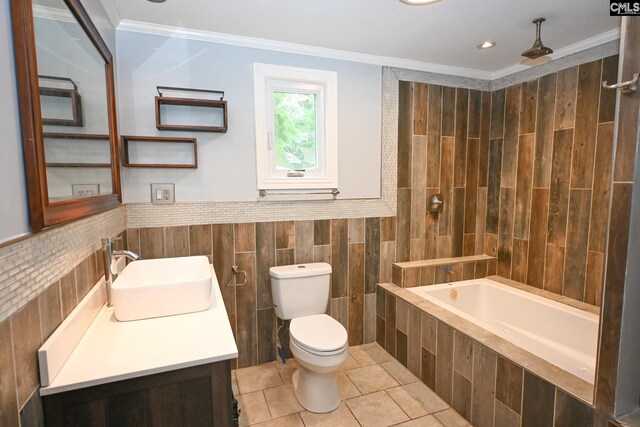 2110 Bouknight St, Newberry, SC 29108 - full bathroom with tile patterned floors, vanity, tile walls, toilet, and ornamental molding