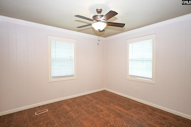 2110 Bouknight St, Newberry, SC 29108 - unfurnished room with dark wood-style floors, ornamental molding, ceiling fan, and baseboards