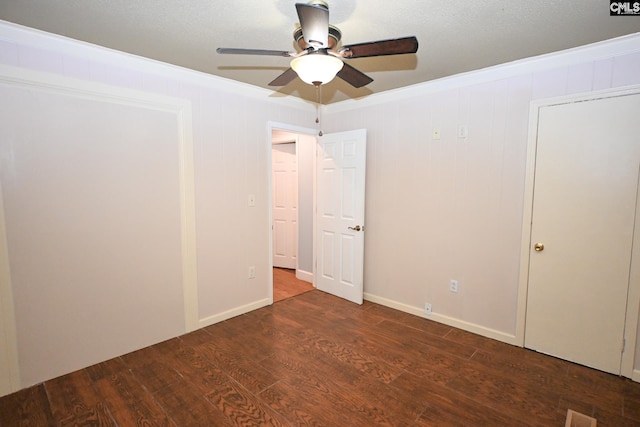 2110 Bouknight St, Newberry, SC 29108 - unfurnished bedroom with dark wood-type flooring, crown molding, and a ceiling fan