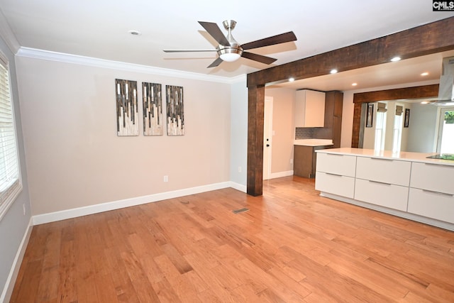 2110 Bouknight St, Newberry, SC 29108 - unfurnished living room with baseboards, a ceiling fan, ornamental molding, light wood finished floors, and recessed lighting