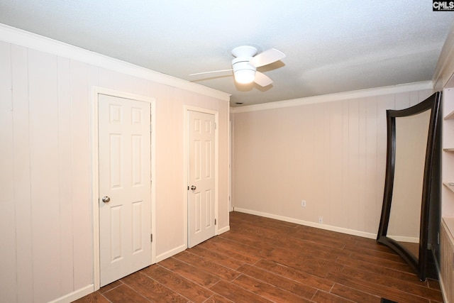 2110 Bouknight St, Newberry, SC 29108 - unfurnished bedroom featuring ornamental molding, dark wood-type flooring, ceiling fan, and baseboards