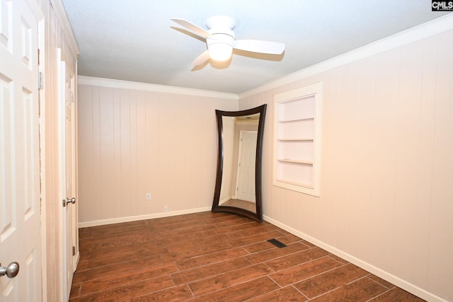2110 Bouknight St, Newberry, SC 29108 - unfurnished bedroom with dark wood-style floors, ornamental molding, baseboards, and ceiling fan