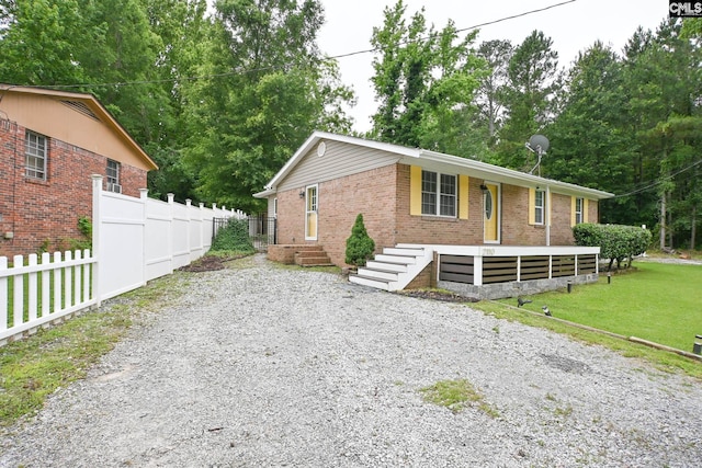 2110 Bouknight St, Newberry, SC 29108 - ranch-style house with brick siding and gravel driveway