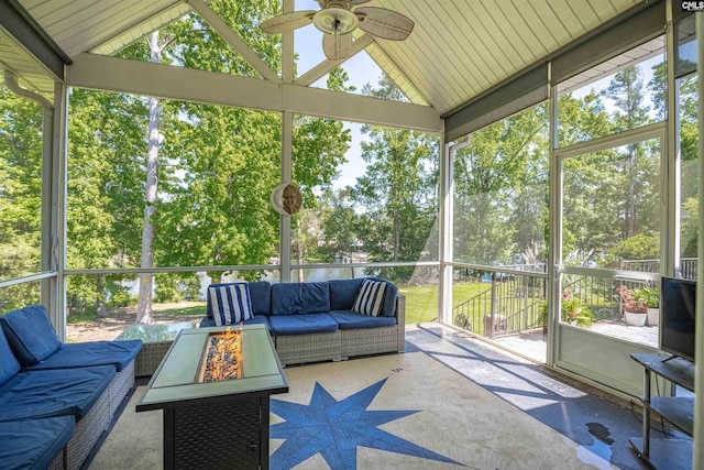 175 Stoney Pointe Dr, Chapin, SC 29036 - sunroom / solarium with an outdoor living space with a fire pit, ceiling fan, lofted ceiling, and view of wooded area