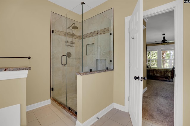 175 Stoney Pointe Dr, Chapin, SC 29036 - full bath featuring connected bathroom, a ceiling fan, a shower stall, and tile patterned flooring