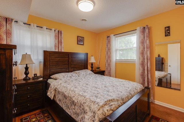 1921 Cunningham Rd, Columbia, SC 29210 - bedroom featuring wood finished floors and baseboards