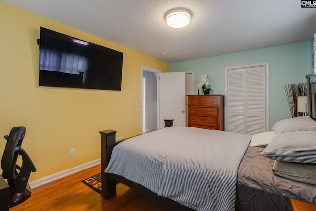 1921 Cunningham Rd, Columbia, SC 29210 - bedroom featuring wood finished floors, a closet, and baseboards
