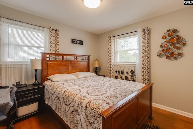 1921 Cunningham Rd, Columbia, SC 29210 - bedroom with dark wood-type flooring and baseboards