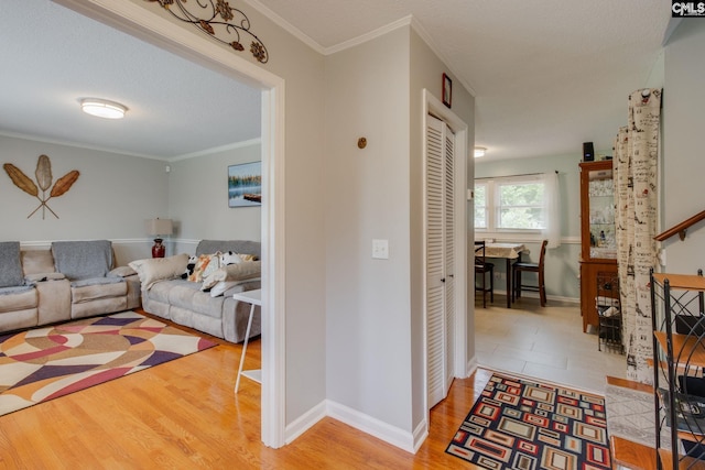 1921 Cunningham Rd, Columbia, SC 29210 - living area featuring wood finished floors, baseboards, and ornamental molding