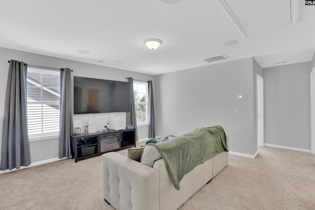1051 Ashcroft Cir, Columbia, SC 29229 - living area with attic access, light carpet, and baseboards