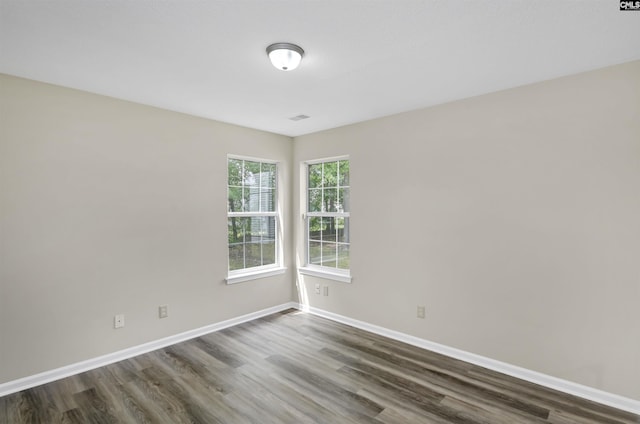 414 Fountain Lk, Columbia, SC 29209 - spare room featuring dark wood-style flooring and baseboards