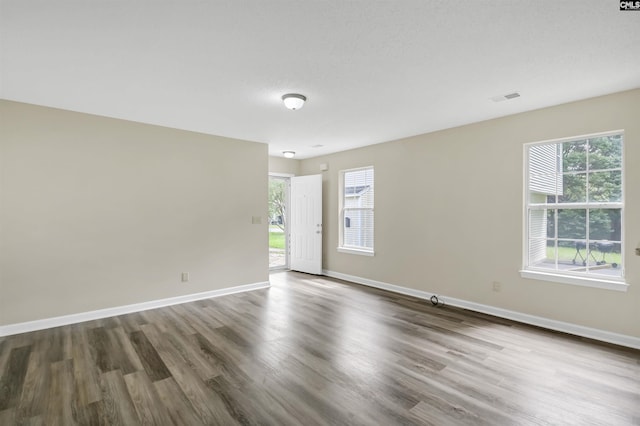 414 Fountain Lk, Columbia, SC 29209 - empty room with plenty of natural light, wood finished floors, and baseboards