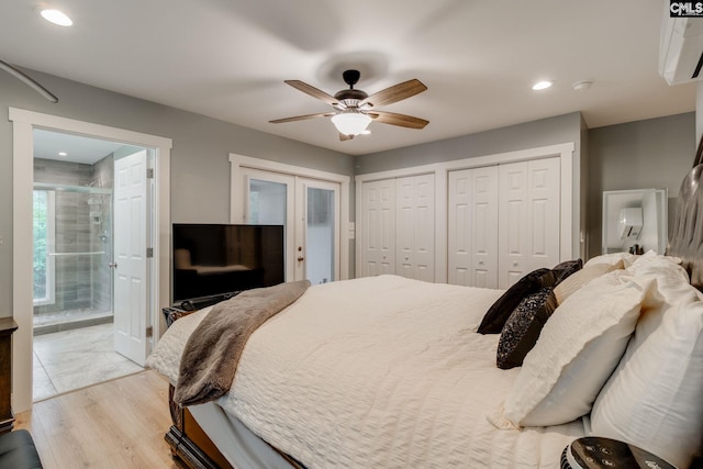 3308 Keenan Dr, Columbia, SC 29201 - bedroom featuring two closets, light wood-type flooring, recessed lighting, connected bathroom, and a ceiling fan