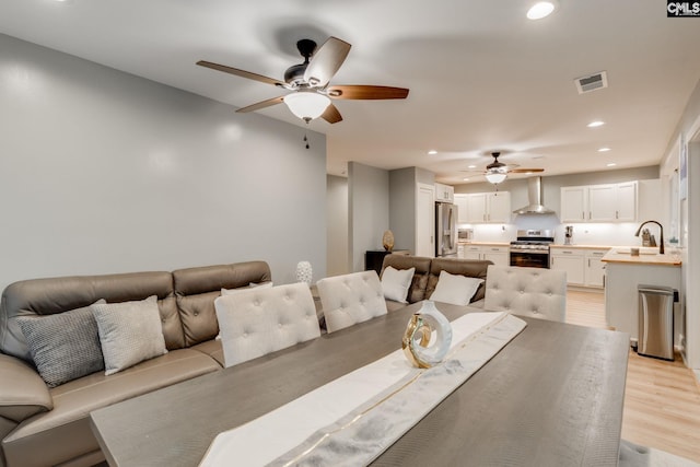 3308 Keenan Dr, Columbia, SC 29201 - dining area with ceiling fan, light wood-style flooring, and recessed lighting