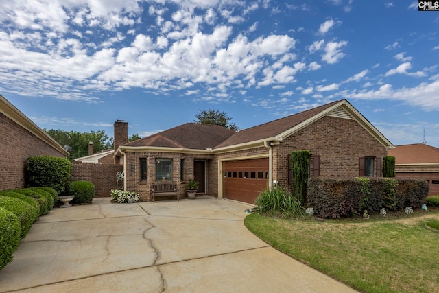 506 Patio Dr, Columbia, SC 29212 - single story home featuring brick siding, a chimney, an attached garage, and driveway
