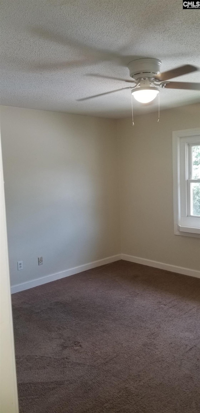 1801 Tall Pines Cir, Columbia, SC 29205 - spare room with ceiling fan, dark carpet, baseboards, and a textured ceiling