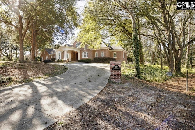 7021 Cleaton Rd, Columbia, SC 29206 - view of front of home featuring curved driveway and brick siding