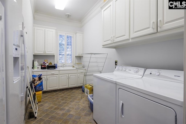 7021 Cleaton Rd, Columbia, SC 29206 - washroom featuring independent washer and dryer, crown molding, and cabinet space