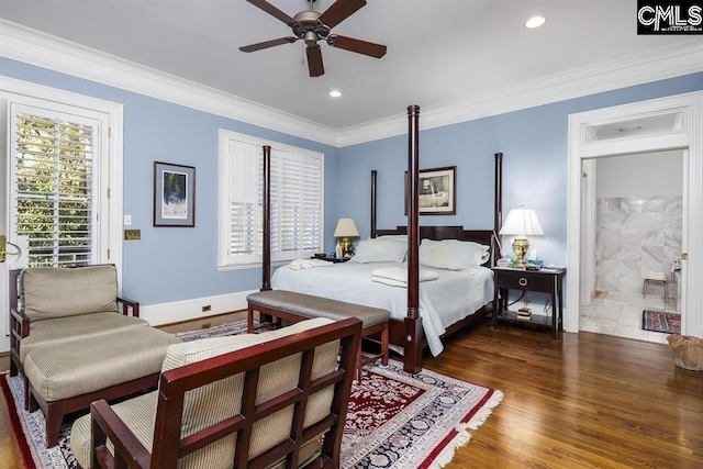 7021 Cleaton Rd, Columbia, SC 29206 - bedroom featuring baseboards, wood finished floors, crown molding, recessed lighting, and ensuite bathroom