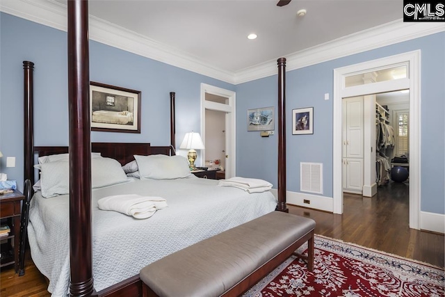 7021 Cleaton Rd, Columbia, SC 29206 - bedroom featuring wood finished floors, crown molding, baseboards, and recessed lighting
