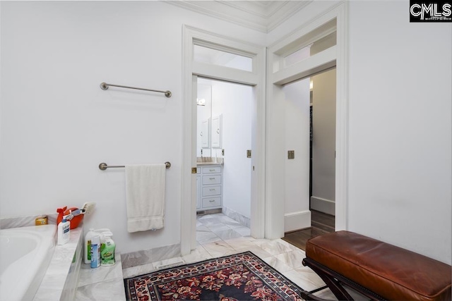 7021 Cleaton Rd, Columbia, SC 29206 - full bath with vanity, a bathtub, crown molding, and marble finish flooring