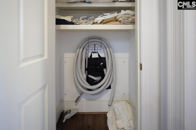 7021 Cleaton Rd, Columbia, SC 29206 - laundry area with wood finished floors