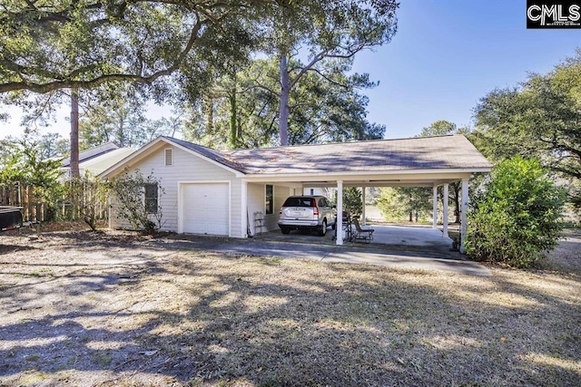 7021 Cleaton Rd, Columbia, SC 29206 - view of vehicle parking with a carport and driveway