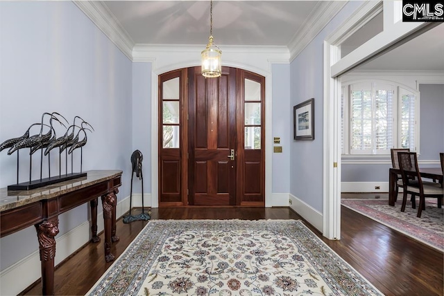 7021 Cleaton Rd, Columbia, SC 29206 - foyer featuring dark wood-style floors, healthy amount of natural light, crown molding, baseboards, and arched walkways