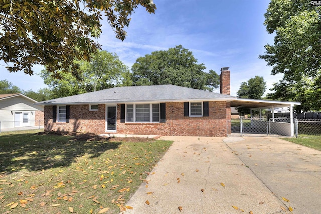 2667 Ford St, Sumter, SC 29154 - ranch-style home with a chimney, brick siding, concrete driveway, and an attached carport