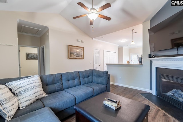 209 Windsor Trace Dr, Columbia, SC 29209 - living room with wood finished floors, a ceiling fan, vaulted ceiling, a glass covered fireplace, and baseboards