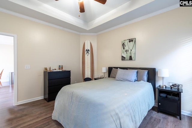 209 Windsor Trace Dr, Columbia, SC 29209 - bedroom with wood finished floors, a raised ceiling, baseboards, crown molding, and ceiling fan
