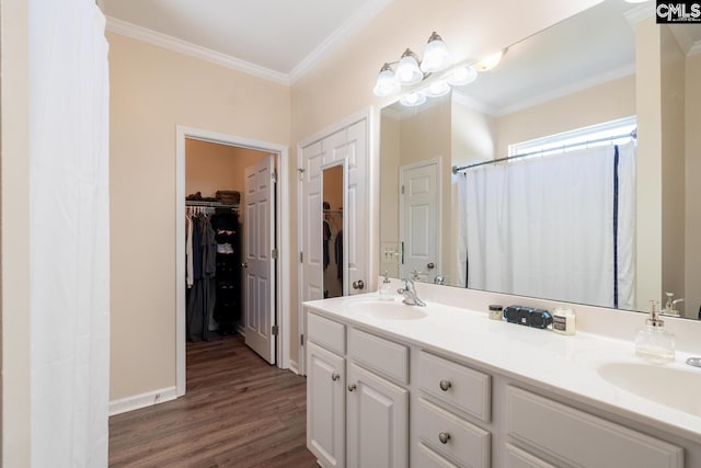 209 Windsor Trace Dr, Columbia, SC 29209 - bathroom featuring crown molding, double vanity, wood finished floors, a spacious closet, and a shower with shower curtain