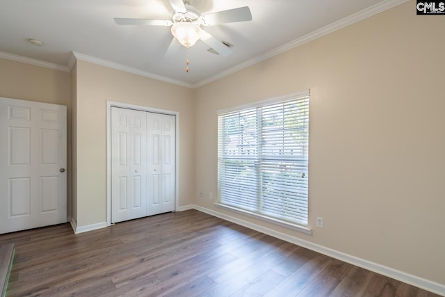 209 Windsor Trace Dr, Columbia, SC 29209 - unfurnished bedroom with wood finished floors, ornamental molding, baseboards, and a closet