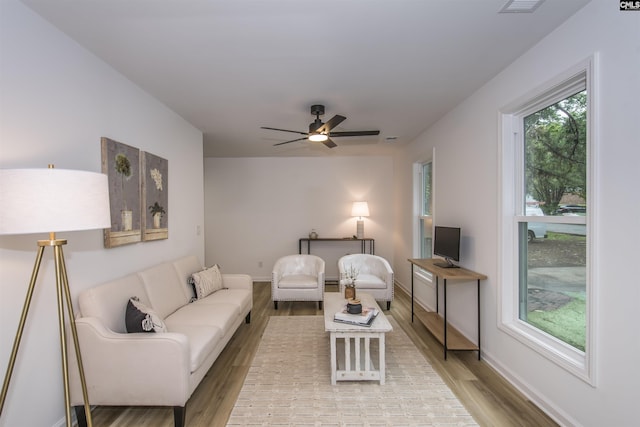 108 Bickleigh Rd, Irmo, SC 29063 - living area with light wood-type flooring, a ceiling fan, and baseboards