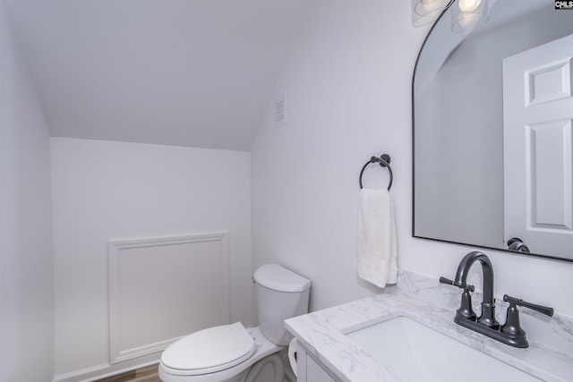 108 Bickleigh Rd, Irmo, SC 29063 - bathroom featuring toilet, vanity, and lofted ceiling