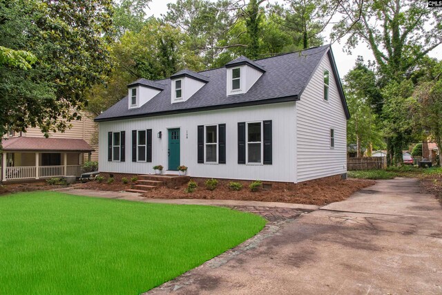 108 Bickleigh Rd, Irmo, SC 29063 - cape cod house featuring crawl space, a shingled roof, a front yard, and driveway