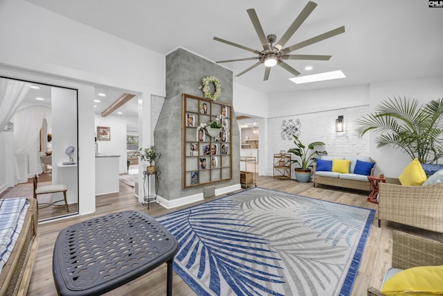 225 Park Shore Dr, Columbia, SC 29223 - living room with a ceiling fan, wood finished floors, a skylight, and recessed lighting