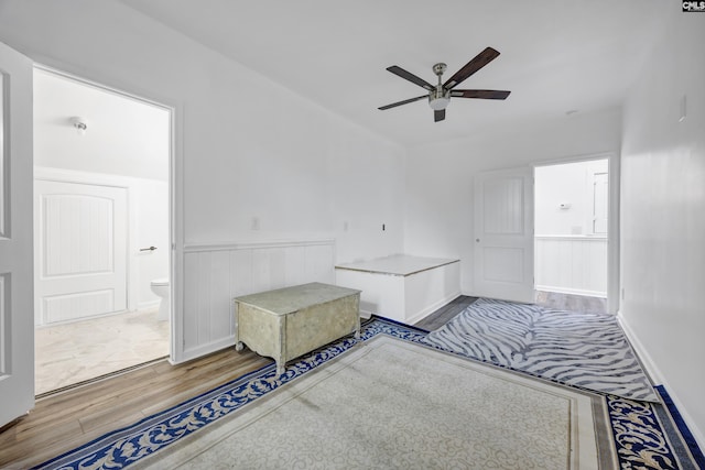 225 Park Shore Dr, Columbia, SC 29223 - interior space featuring wood finished floors, ceiling fan, and wainscoting