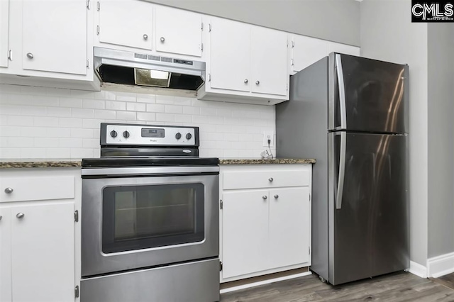 619 King St Unit 608, Columbia, SC 29205 - kitchen featuring stainless steel appliances, under cabinet range hood, white cabinets, dark wood-type flooring, and backsplash