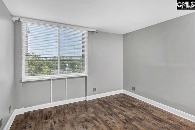 619 King St Unit 608, Columbia, SC 29205 - unfurnished room featuring baseboards and wood finished floors