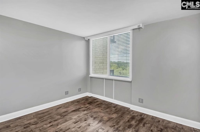 619 King St Unit 608, Columbia, SC 29205 - unfurnished room featuring baseboards and dark wood-style floors