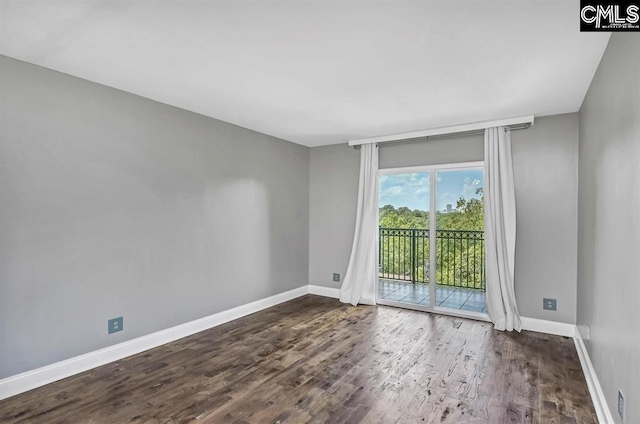 619 King St Unit 608, Columbia, SC 29205 - empty room with wood finished floors and baseboards