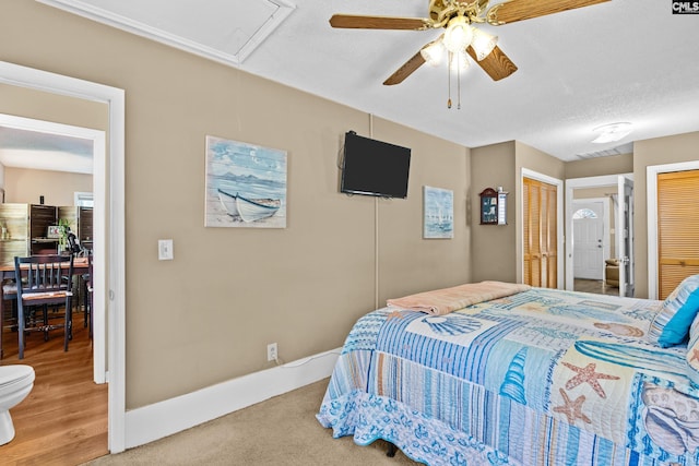 319 Graham St, West Columbia, SC 29169 - bedroom featuring attic access, two closets, baseboards, and ceiling fan